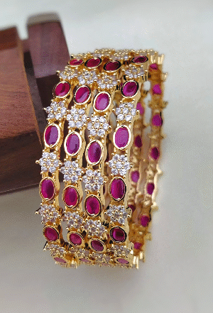 Ad ruby and kemp bangles